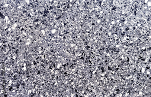 Background of gray granite. The texture of granite.