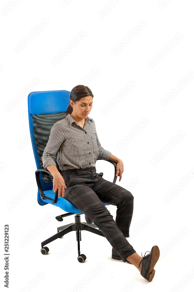 Woman doing exercises while sitting on the office chair, isolated on white Woman doing exercises while sitting on the office chair, isolated on white