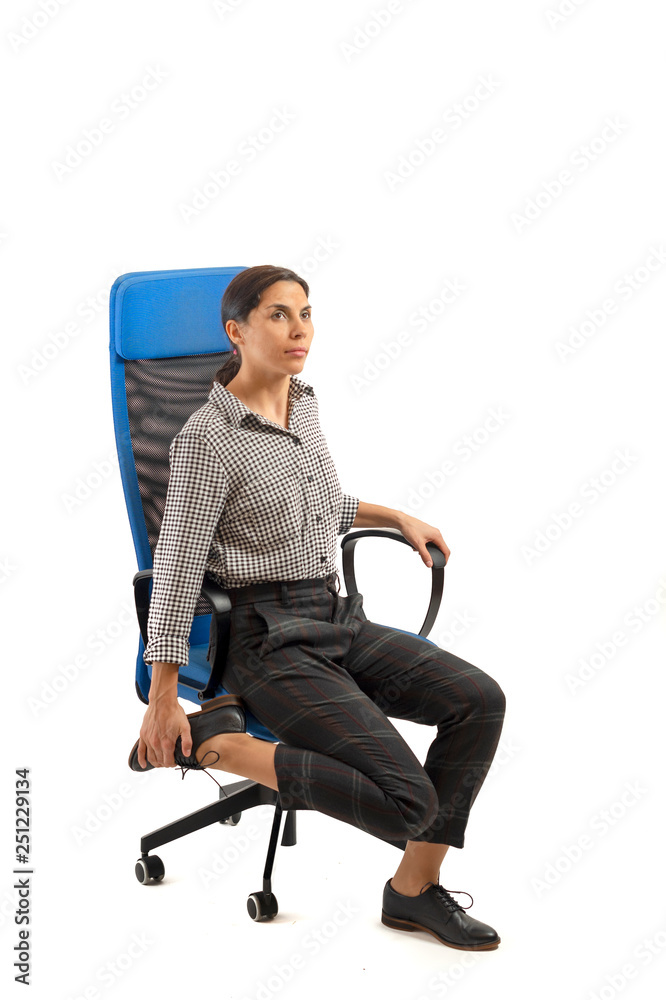 Fototapeta premium Woman doing exercises while sitting on the office chair, isolated on white