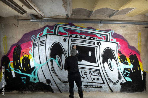 ghettoblaster graffiti on a wall
