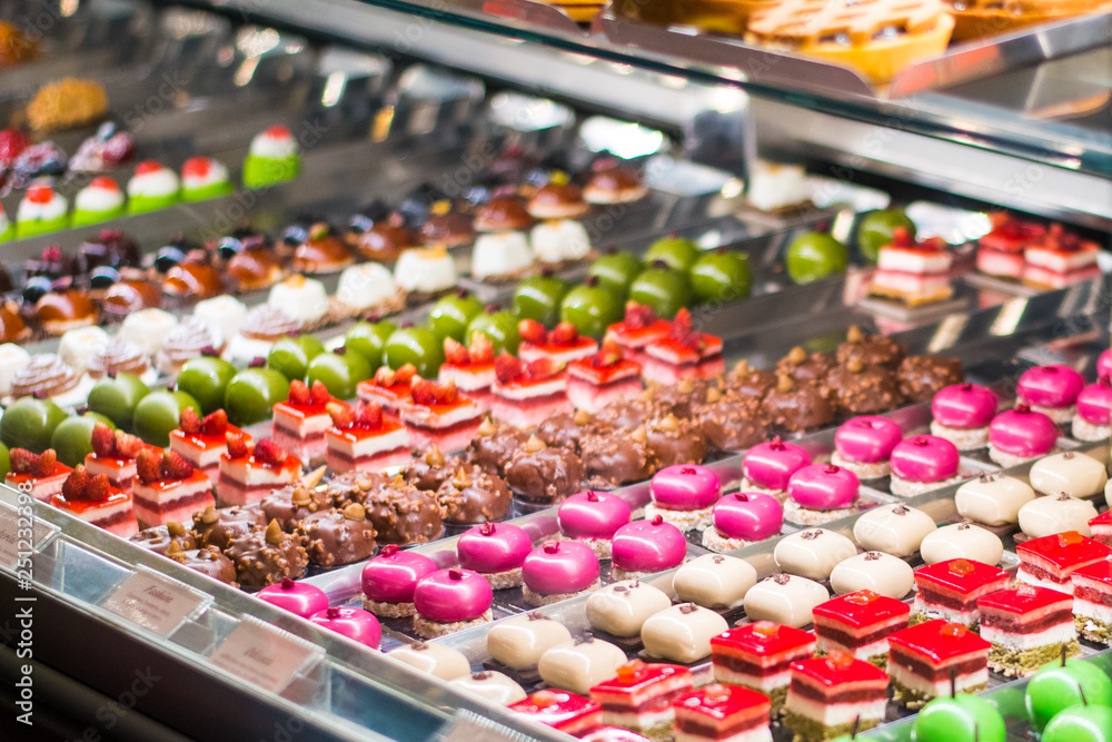 Two Pastries (dolci) In A Glass Counter In an Italian Pastry Shop (pasticceria) In Rome, Italy. Two Pastries (dolci) In A Glass Counter In an Italian Pastry Shop (pasticceria) In Rome, Italy.