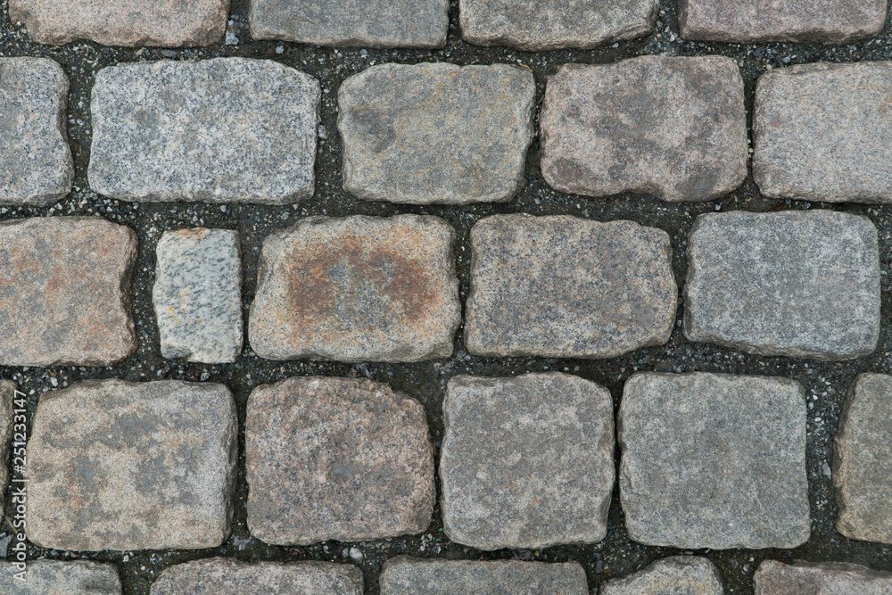 Old cobbled stone texture background, pavement structure on road. Old cobbled stone texture background, pavement structure on road.