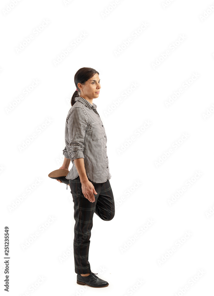 Fototapeta premium Young businesswoman isolated on white background doing exercises