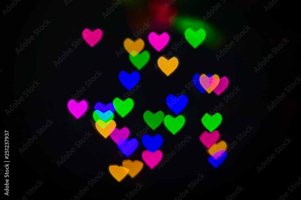 Heart bokeh background, Love and Valentine day concept. Multicolored Shiny hearts light