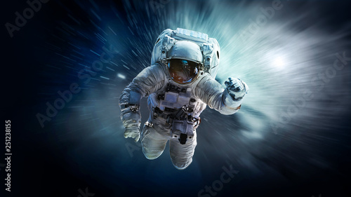 Fototapeta Naklejka Na Ścianę i Meble -  Astronaut in outer space. Elements of this image furnished by NASA