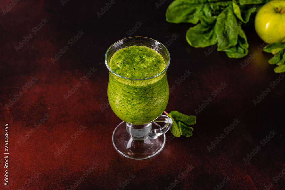 Ginger green apple smoothie on concrete background. It can be used as a background Ginger green apple smoothie on concrete background. It can be used as a background