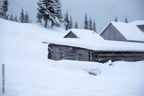 Snowy house in the mountains © Olivkairishka