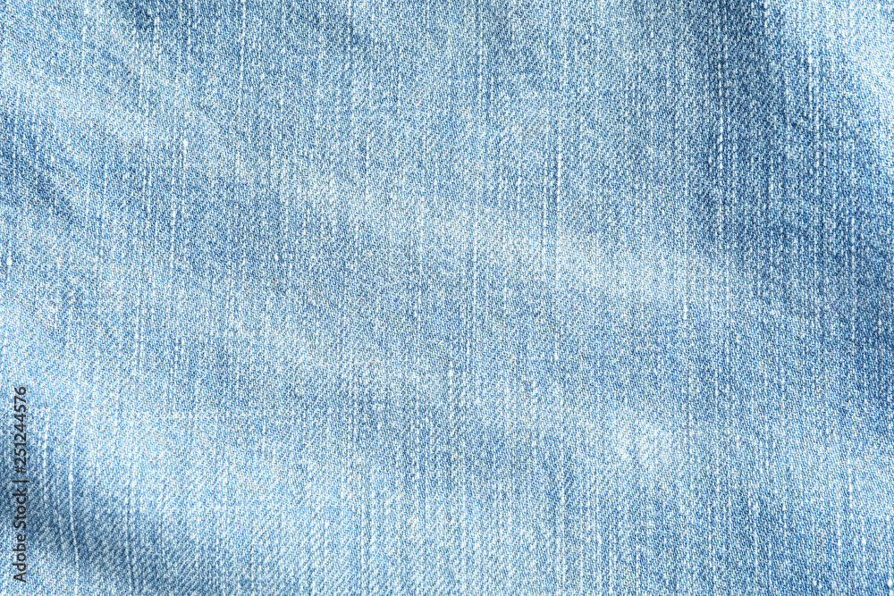 Texture of blue jeans as background, space for text Texture of blue jeans as background, space for text