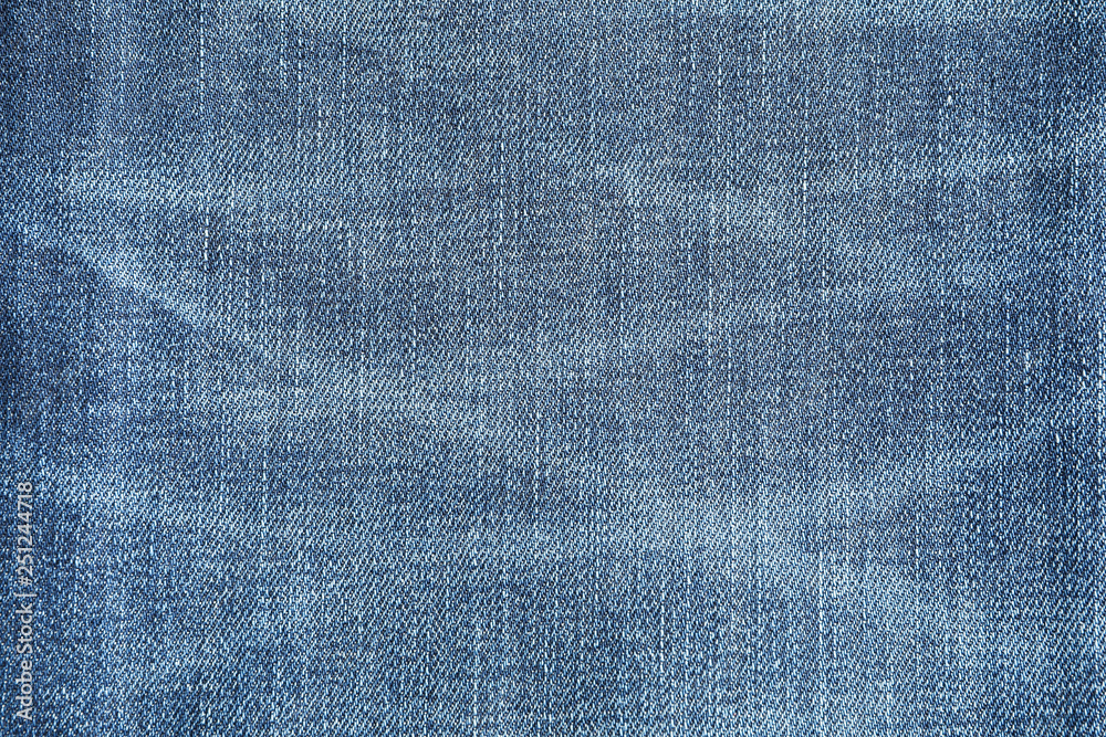 Texture of blue jeans as background, space for text Texture of blue jeans as background, space for text