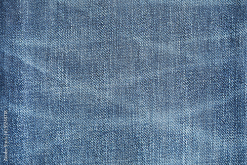 Texture of blue jeans as background, space for text
