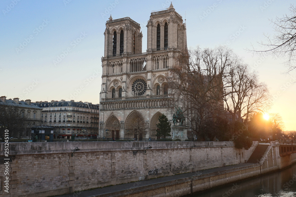 The Notre Dame Cathedral at sunrise , Paris, France.