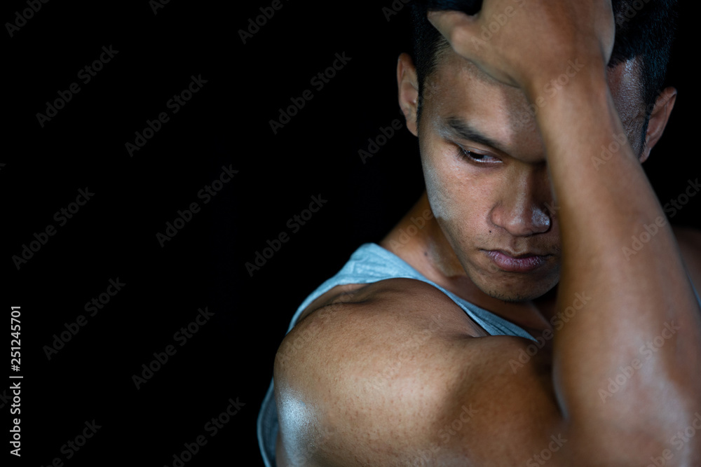 Asian muscle men on the black background