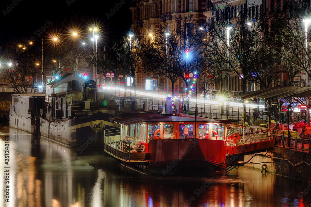 Night restaurants on big boats, river Ill in Strasbourg
