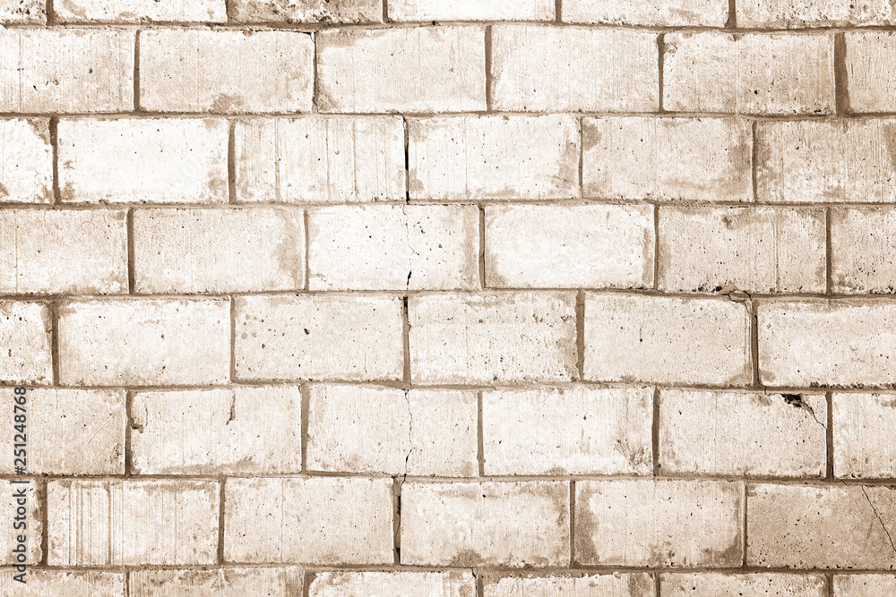 Light brown wall made of large bricks. Background with brickwork texture.  Stock Photo | Adobe Stock