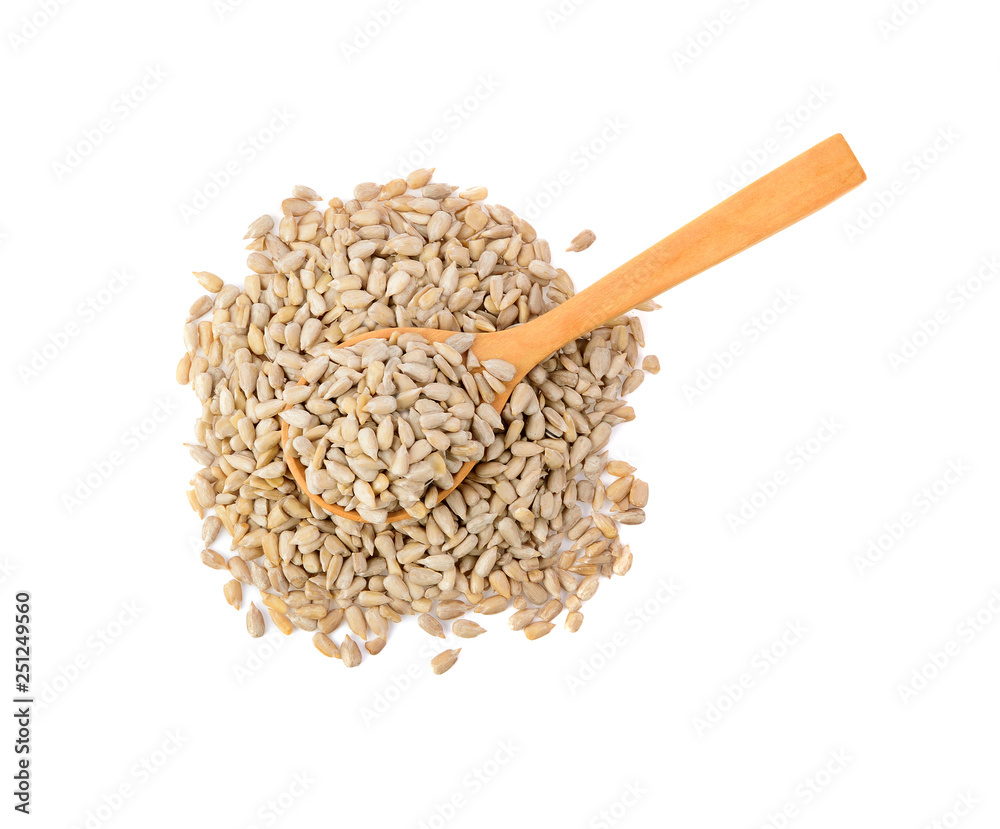 sunflower seeds in wood spoon isolated on white background sunflower seeds in wood spoon isolated on white background