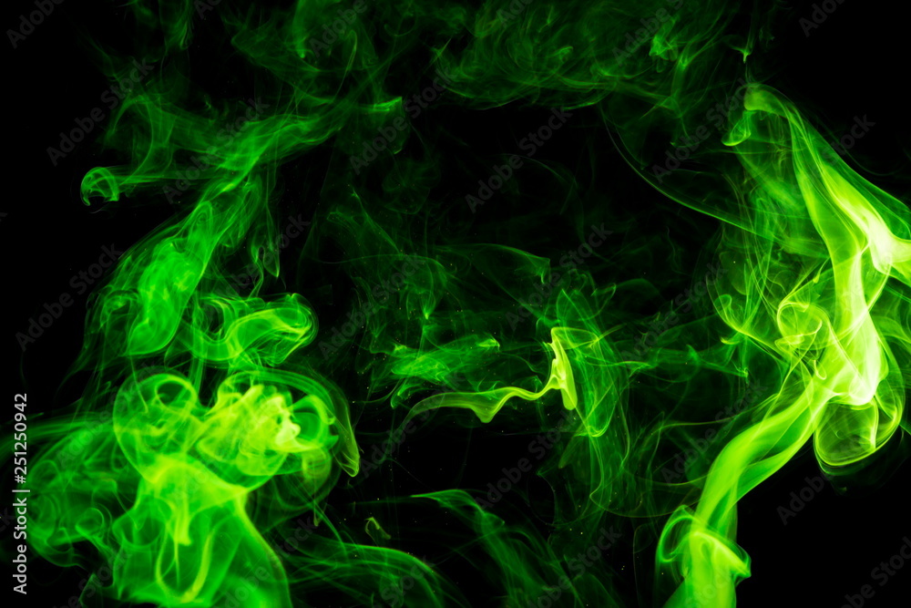 Green smoke on black background Green smoke on black background
