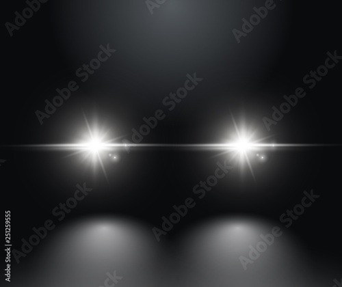 Cars light effect. White glow car headlight bright beams ray isolated on black background photo