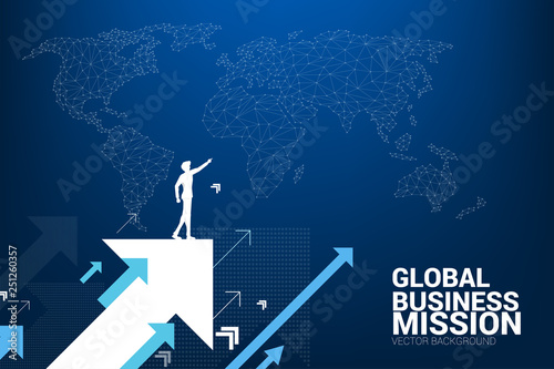 Silhouette of businessman point forward on moving up arrow with world map background. concept of growth business and leadership.