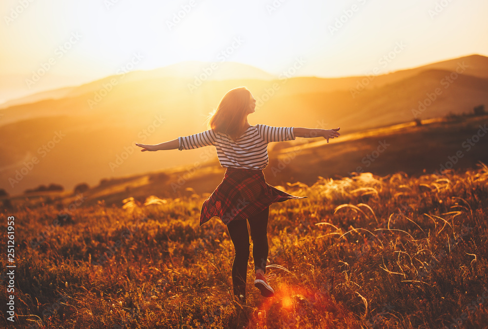 Happy Woman Jumping And Enjoying Life In Field At Sunset In Mountains Stock  Photo, Picture and Royalty Free Image. Image 97035120.