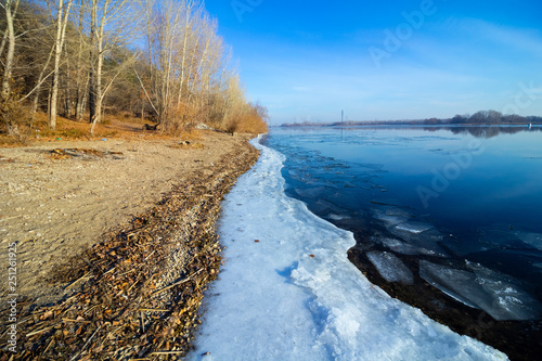 Coast of a frozen river