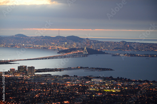 sunset on san francisco bay with panoramic view of the city