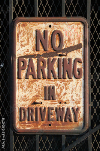 Rusty grunge-style No Parking sign