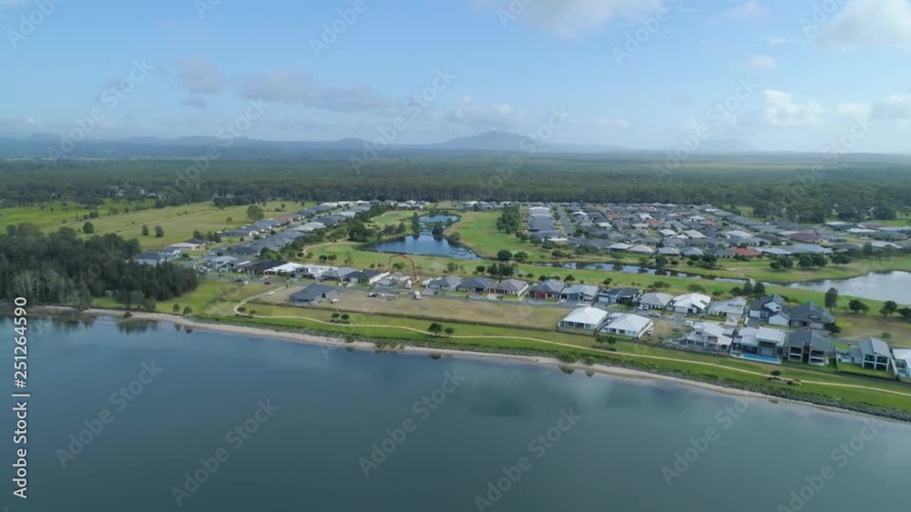 Forward flight rising high towards Harrington town and countryside Forward flight rising high towards Harrington town and countryside