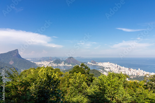 Beautiful landscape with rainforest, city district (Leblon, Ipanema, Botafogo), Lagoon Rodrigo de Freitas and mountains (corcovado, sugarloaf, two brothers ) seen from Vista Chinesa in Tijuca Forest, 