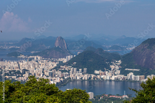 Beautiful landscape with rainforest, city district (Leblon, Ipanema, Botafogo), Lagoon Rodrigo de Freitas and mountains (corcovado, sugarloaf, two brothers ) seen from Vista Chinesa in Tijuca Forest, 