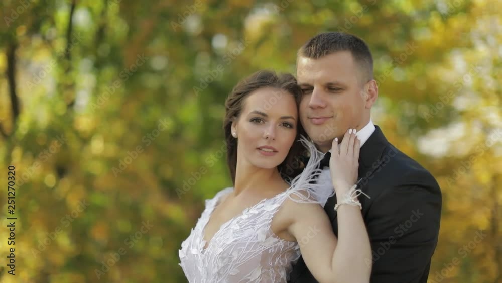 Wedding couple. Lovely groom and bride. Happy family. Man and woman in love. Wedding day. Slow motion Wedding couple. Lovely groom and bride. Happy family. Man and woman in love. Wedding day. Slow motion