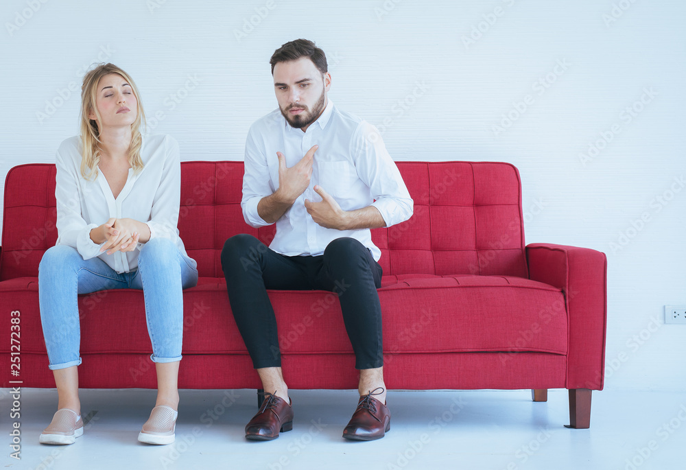 Obraz premium Husband quarrel with wife conflict and boring couple in the living room,Negative emotions