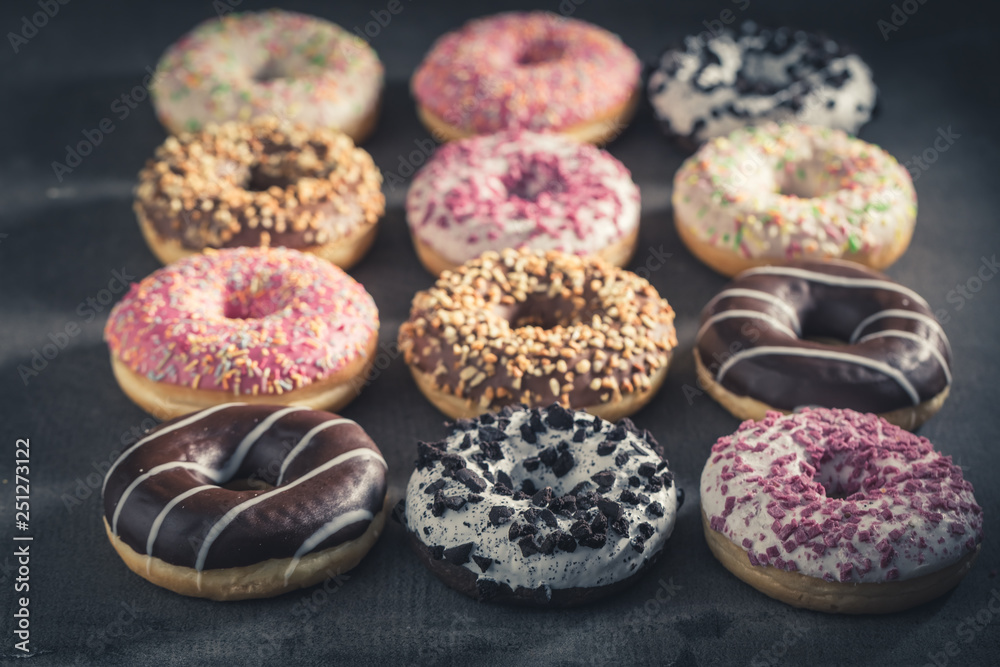 Sweet and tasty donuts with different sprinkles Sweet and tasty donuts with different sprinkles
