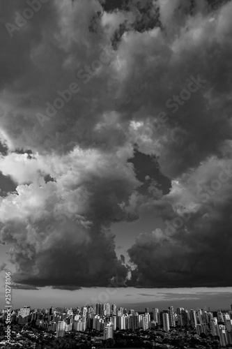 Beautiful view of the dramatic dark stormy sky in black and white. The rain is coming soon. Pattern of the clouds over city. Very heavy rain sky in Sao Paulo city, Brazil South America. 