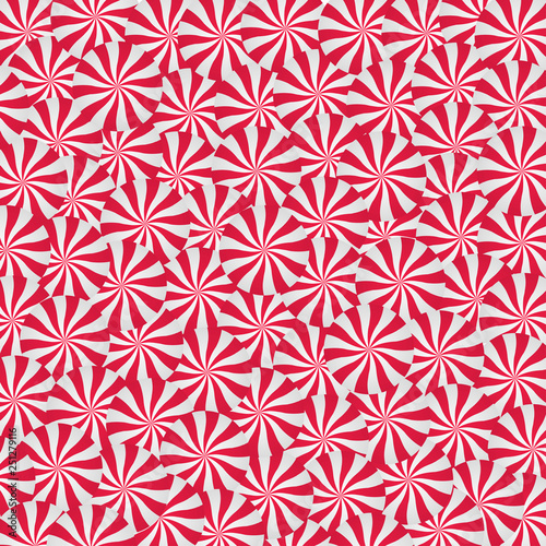 Peppermint cream candies background. Spiral red and white repeated form. Sweet shop design.