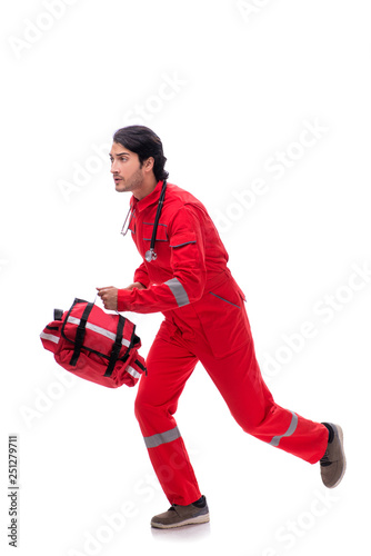 Young paramedic in red uniform isolated on white 
