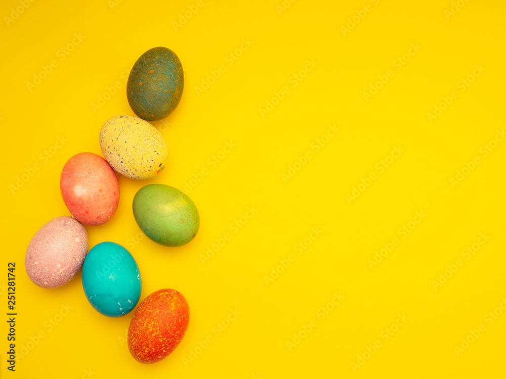 Colorful Easter Eggs On Yellow Background Colorful Easter Eggs On Yellow Background