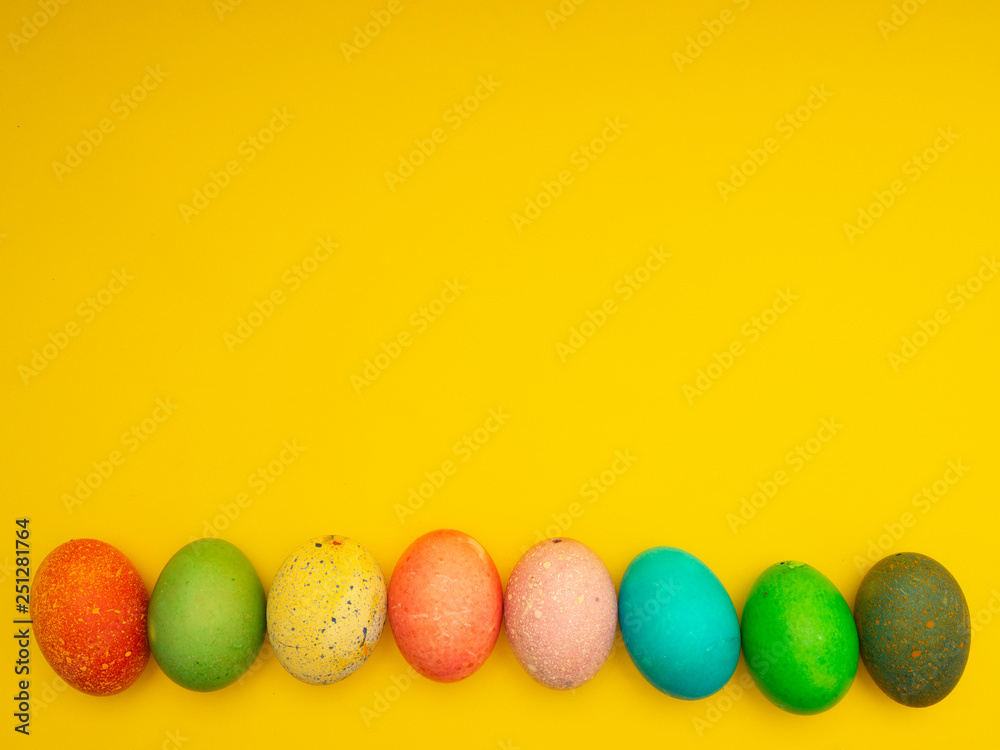 Colorful Easter Eggs On Yellow Background Colorful Easter Eggs On Yellow Background
