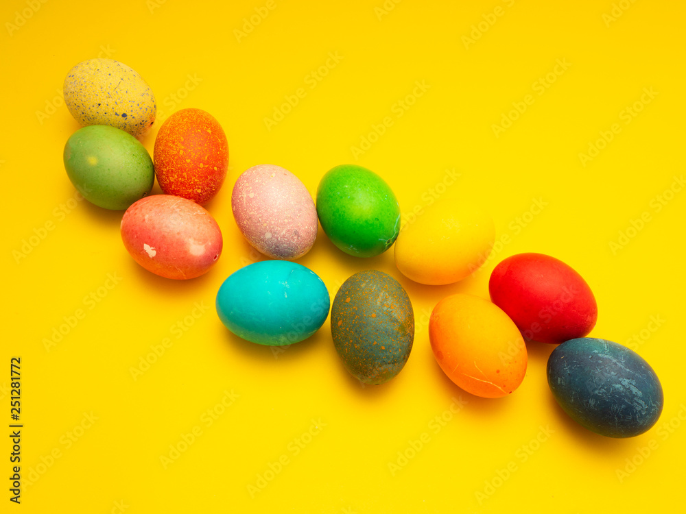 Colorful Easter Eggs On Yellow Background Colorful Easter Eggs On Yellow Background