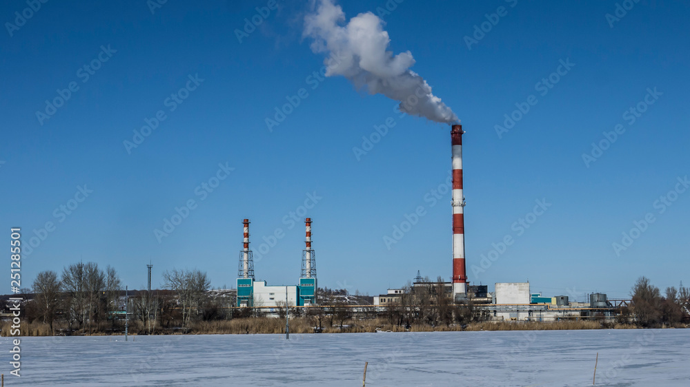 enterprise chimneys against a clear blue sky