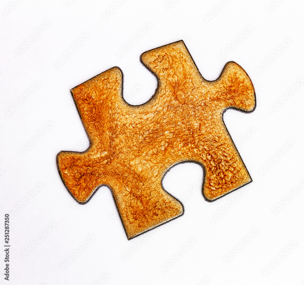 Puzzleteil aus Kupfer Puzzleteil aus Kupfer
