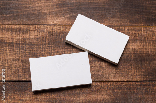Mock up of business cards on wood background