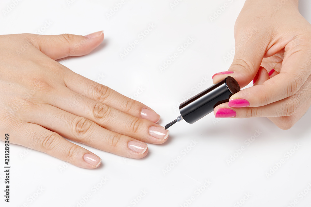 paint one's nails with a brush. Menicure. paint one's nails with a brush. Menicure.