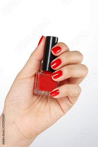 hold nail cosmetics with one's. Menicure.