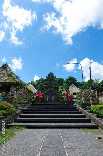 Penglipuran Village with blue skies above, Kubu, Bangli, Bali, Indonesia photo