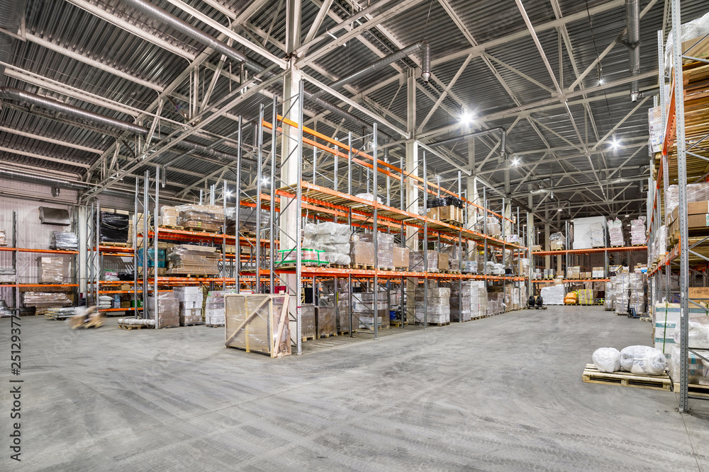 Long shelves with a variety of boxes and containers. Long shelves with a variety of boxes and containers.