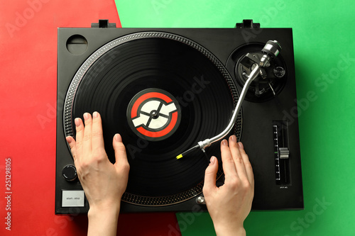 Female DJ mixing music on c...