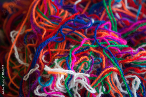 The intricated multi-colored yarn threads, close up