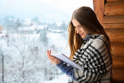 Beautiful woman reading boo...