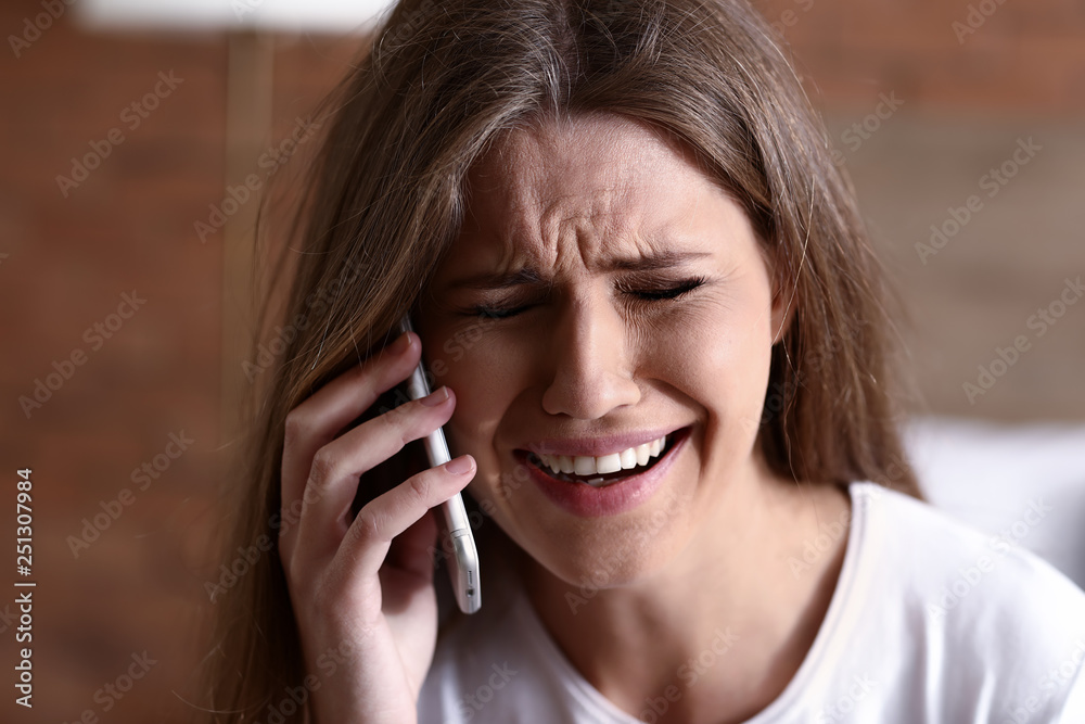 Young afraid woman calling for help at home. Suicide concept Young afraid woman calling for help at home. Suicide concept