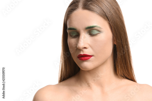 Beautiful woman with unusual makeup on white background